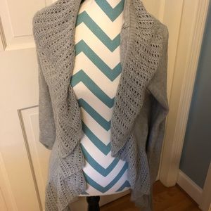 Grey women’s cardigan.